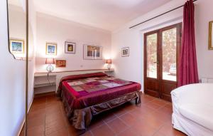 Ένα ή περισσότερα κρεβάτια σε δωμάτιο στο Casa Upupa