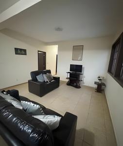 Ruang duduk di Sitio com Piscina AQUECIDa e 5 quartos c/ suíte!
