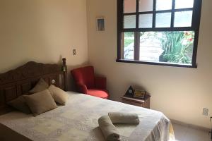 Katil atau katil-katil dalam bilik di Sitio com Piscina AQUECIDa e 5 quartos c/ suíte!