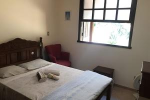 Katil atau katil-katil dalam bilik di Sitio com Piscina AQUECIDa e 5 quartos c/ suíte!