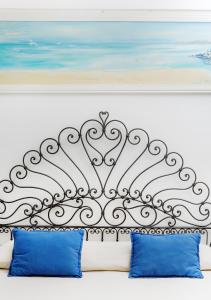 A bed or beds in a room at Il Giardino dell'Arte
