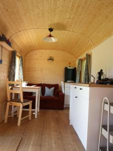 Kuchyň nebo kuchyňský kout v ubytování Löwenzahn-Lodge + 5 fotografií