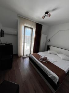 Postel nebo postele na pokoji v ubytování Elegance
