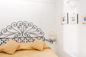 A bed or beds in a room at Il Giardino dell'Arte