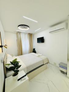 Μια τηλεόραση ή/και κέντρο ψυχαγωγίας στο A y A apartamento +8 φωτογραφίες