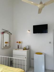 TV o dispositivi per l'intrattenimento presso Tropical Harbour View