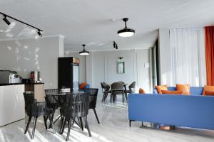 Kuchyň nebo kuchyňský kout v ubytování Sun Wine Hotel