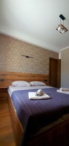 Llit o llits en una habitació de Guest house "Soulmate"