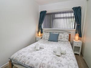 Postel nebo postele na pokoji v ubytování 14 Coedrath Park