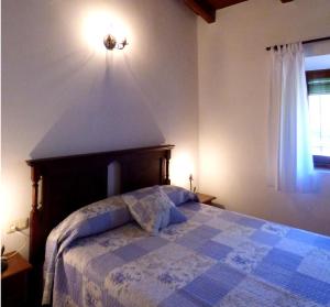 Postelja oz. postelje v sobi nastanitve Casa Rural El Poleo