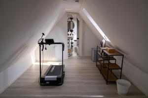 a treadmill in the middle of a stair room at Ferienwohnung in Karlburg in Karlstadt