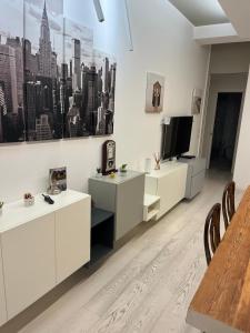 TV a/nebo společenská místnost v ubytování B&B Leus Appartment