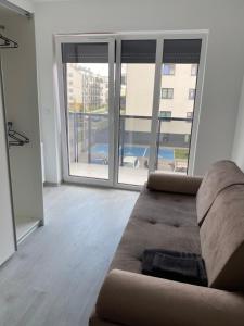 Χώρος καθιστικού στο Apartamenty JAGODNO
