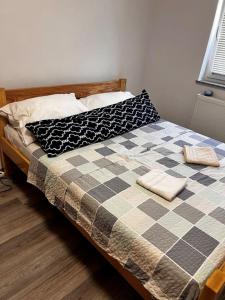 Postel nebo postele na pokoji v ubytování Apartman Borna