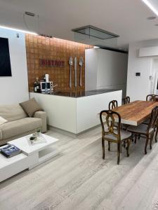 Kuchyň nebo kuchyňský kout v ubytování B&B Leus Appartment