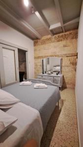 Ένα ή περισσότερα κρεβάτια σε δωμάτιο στο Symi_Villa_Ilias
