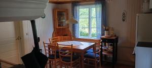 Posezení v ubytování Månsarps skogs- och alpackagård + 30 fotografií