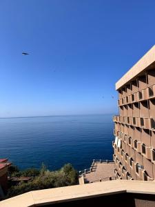 a view of the ocean from a building at Ste.Mar Apartments in Teulada