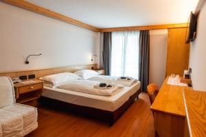 Letto o letti in una camera di Hotel St. Michael