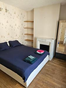 Ένα ή περισσότερα κρεβάτια σε δωμάτιο στο Charming 3-Bedroom House, Perfect for Family Getaways or Extended Professional Stays