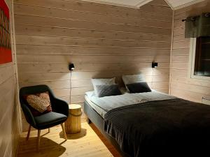 Ένα ή περισσότερα κρεβάτια σε δωμάτιο στο Log cottages in 10 min from Santa Claus Village-Sauna&FreeParking +43 φωτογραφίες