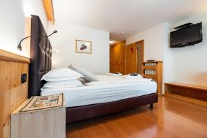 Letto o letti in una camera di Hotel St. Michael