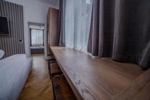 Postel nebo postele na pokoji v ubytování AcAsA