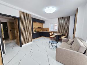 Dapur atau dapur kecil di Ukośna Apartaments