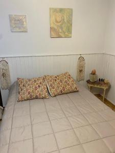 Ένα ή περισσότερα κρεβάτια σε δωμάτιο στο La Casona de Maria