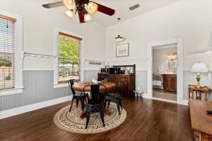 a dining room with a table and chairs at #14 The Country Suite at Garrison in Gruene in New Braunfels