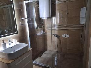 Koupelna v ubytování Premier Apartment