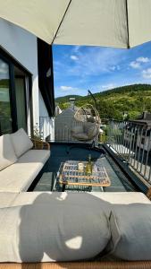 Foto dalla galleria di Schickes Penthouse-Apartment mit Weinbergblick a Schweich