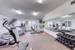 a gym with treadmills and exercise bikes in it at Eagles Unit #1 in Jeffersonville