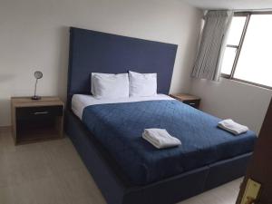 Postel nebo postele na pokoji v ubytování Hermosa casa grande en San Manuel