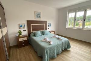 Ένα ή περισσότερα κρεβάτια σε δωμάτιο στο Casa de Pili +18 φωτογραφίες