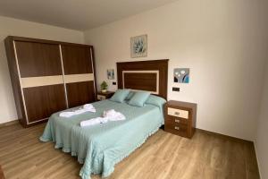 Ένα ή περισσότερα κρεβάτια σε δωμάτιο στο Casa de Pili