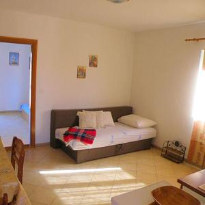 Postel nebo postele na pokoji v ubytování Apartments Ana