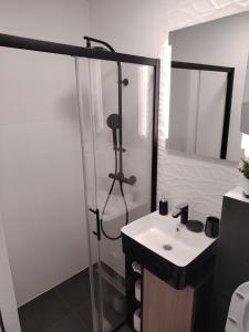 Koupelna v ubytování Niko + 11 fotografií