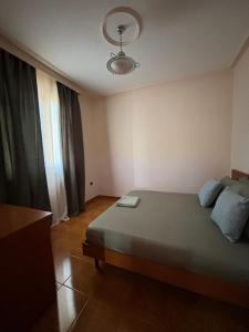 Postel nebo postele na pokoji v ubytování Hotel Vlora 78
