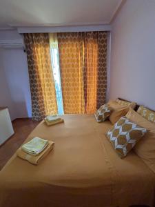Postel nebo postele na pokoji v ubytování Hotel Vlora 78