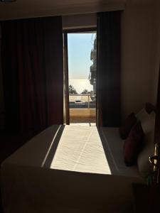 Postel nebo postele na pokoji v ubytování Hotel Vlora 78