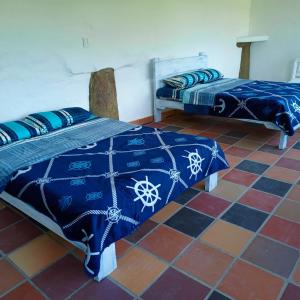 A bed or beds in a room at AZULEJO