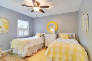 Кровать или кровати в номере Riverfront Getaway with Hot Tub and Game Room!