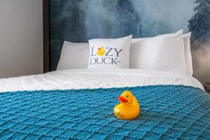 Letto o letti in una camera di Lazy Duck Inn