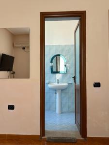 Koupelna v ubytování Hotel Vlora 78