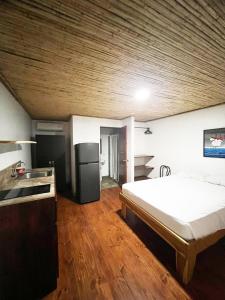 Postel nebo postele na pokoji v ubytování Hotel Tama Lodge + 37 fotografií