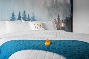 Letto o letti in una camera di Lazy Duck Inn