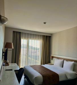 Ein Bett oder Betten in einem Zimmer der Unterkunft KanyonVadi Otel SAFRANBOLU-KARABÜK