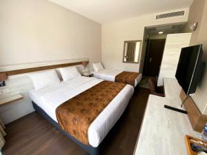 Ein Bett oder Betten in einem Zimmer der Unterkunft KanyonVadi Otel SAFRANBOLU-KARABÜK