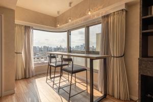 Foto da galeria de NC Square Shinjuku -All Suite Residence- em Tóquio